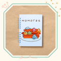 Visuel du cahier spiracle illustré d'une bande de momotes
