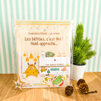 Photo du pack contenant le livre pour enfant les bêtises, c'est fini ! Noël approche... et un marque page aimanté avec un sachet de stickets.