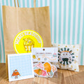Un sachet kraft anniversaire et son contenue pour remercier