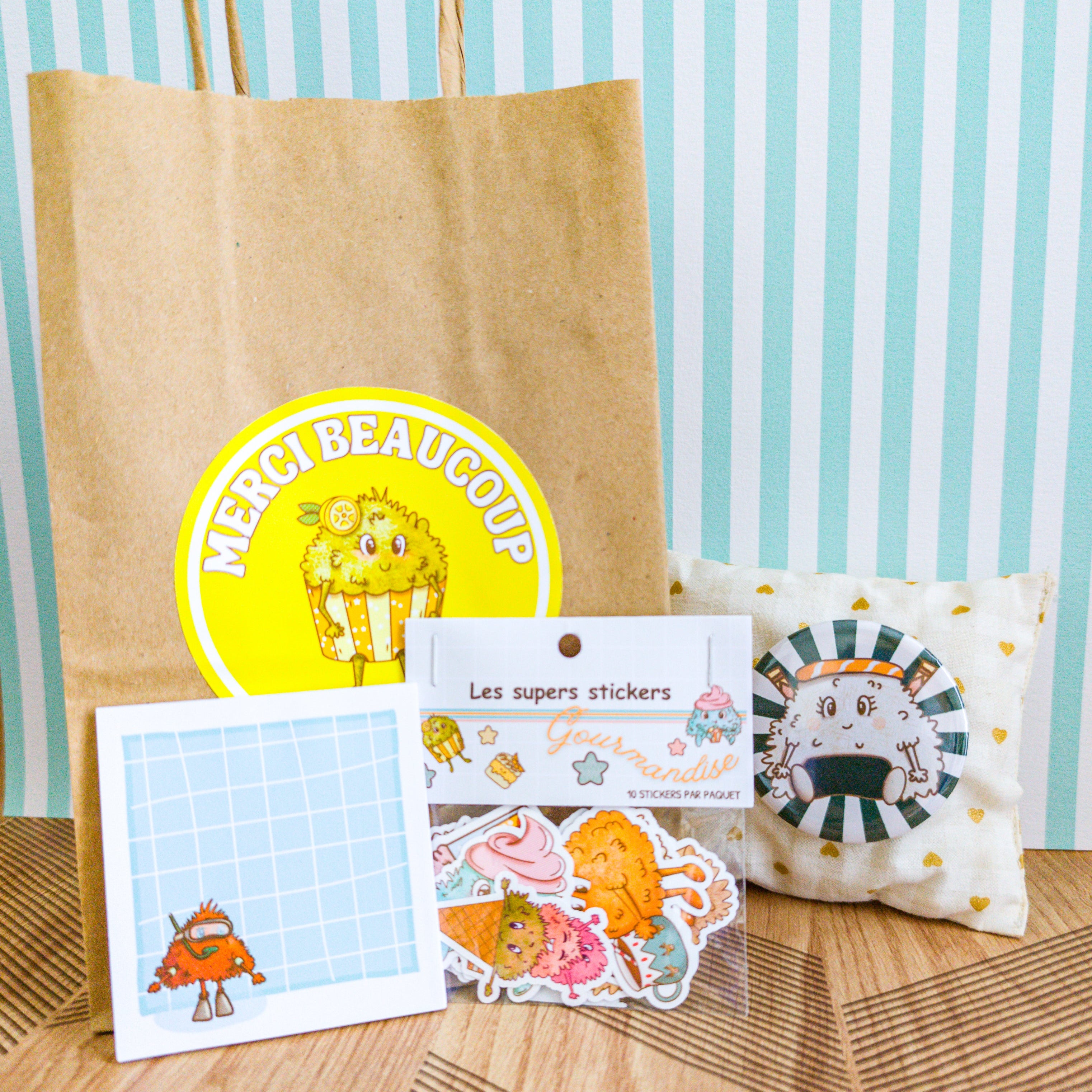 Un sachet kraft anniversaire et son contenue pour remercier