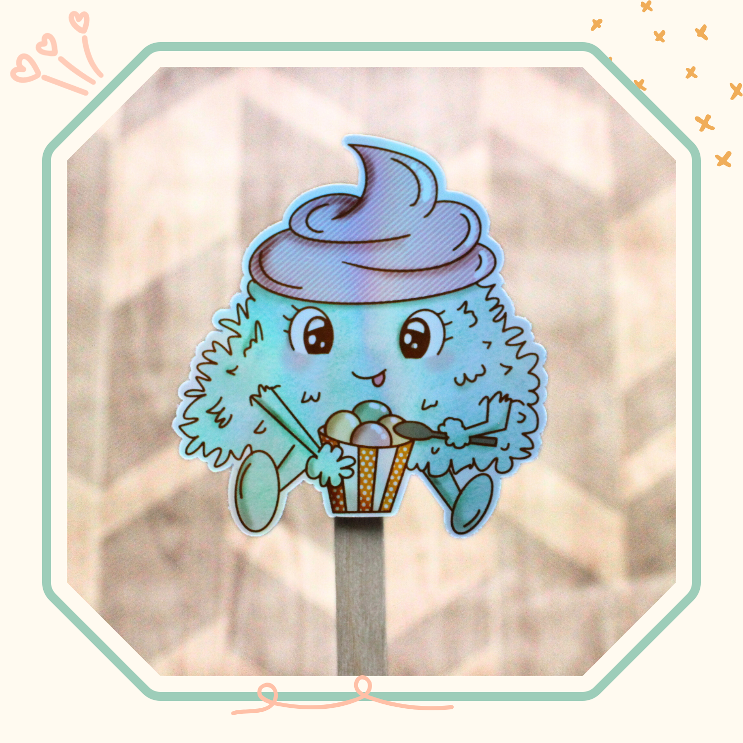 Un sticker holographique de la momote creamy